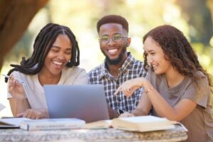 imgi 22 students friends group with laptop laughing funny meme education scholarship comic portrait happy people black man women with computer laugh joke h.jpg